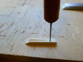 Durchstechen der Zunge für den Kiel